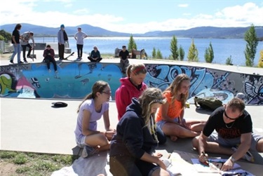 Youth sitting at Skate Park