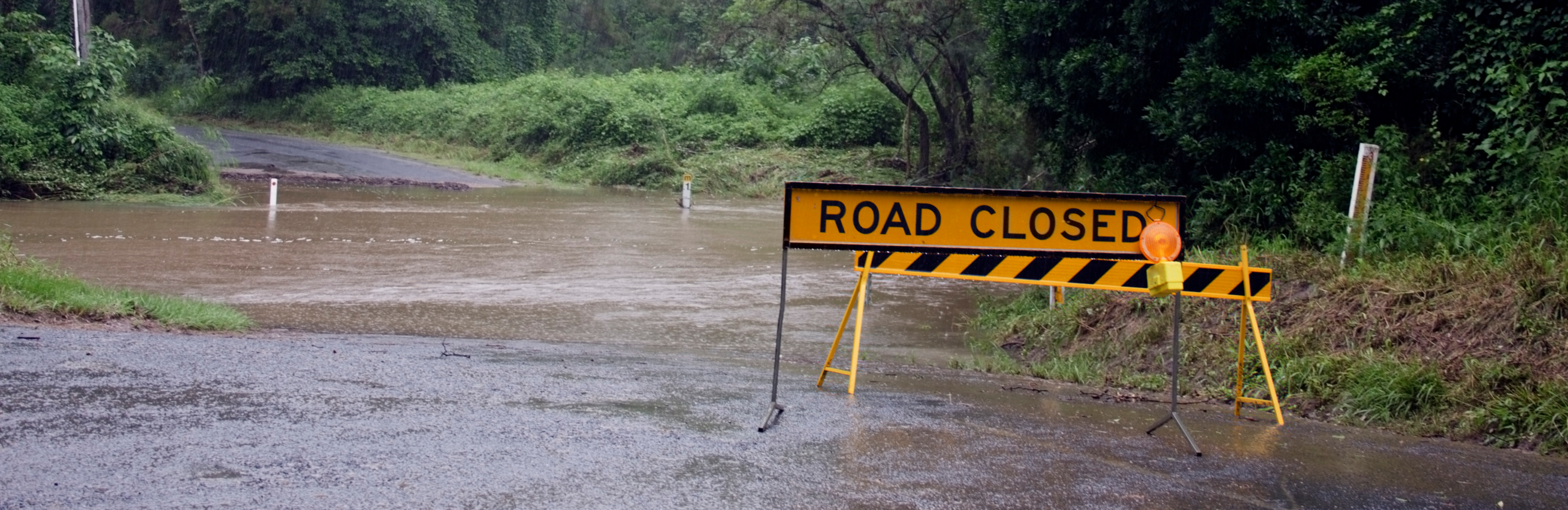 Road-closed-water-over-road.png