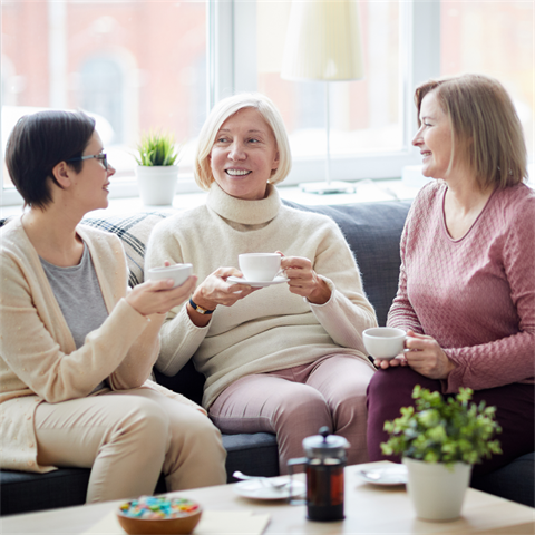 Ladies chatting over coffee.png
