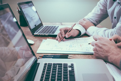 Office workers working with financial documents