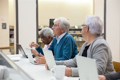 Seniors learning about technology at a library