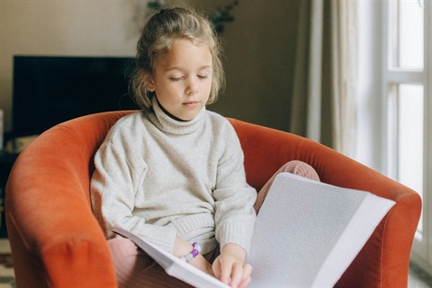 Young girl reading braille brooke - Pexels_crop.jpg