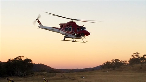 Rescue Chopper landing at sunset during bushfires.jpg